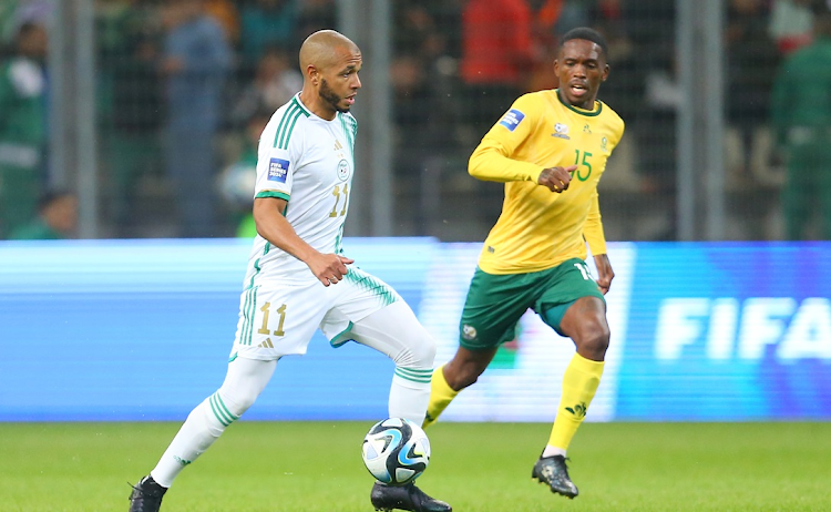 Algeria captain Yacine Brahimi is challenged by Thabang Monare of South Africa during their Fifa Series friendly at the Nelson Mandela Stadium in Algeria.