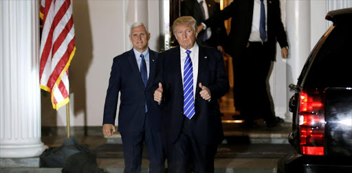 U.S. President-elect Donald Trump and Vice President-elect Mike Pence depart the main clubhouse at Trump National Golf Club in Bedminster, New Jersey, U.S., November 19, 2016.