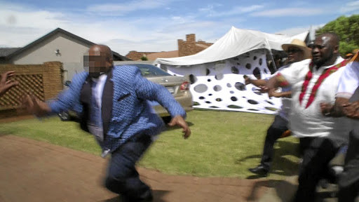 The groom leads the chase of Moja Love TV crew at his wedding.