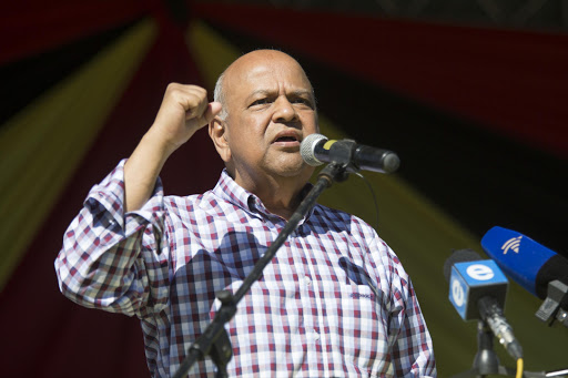 South African Communist Party supporters cheered former Finance Minister Pravin Gordhan at a mini rally in Durban on Saturday.