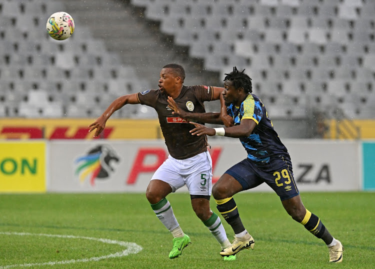 AmaZulu’s Thembela Sikhakhane and Cape Town City’s Joaquim Paciencia vie for the ball. Picture: BACKPAGEPIX