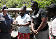 Chumani Maxwele of the Black People's National Crisis Committee outside the Cape Town business park that houses the FW de Klerk Foundation on Wednesday.