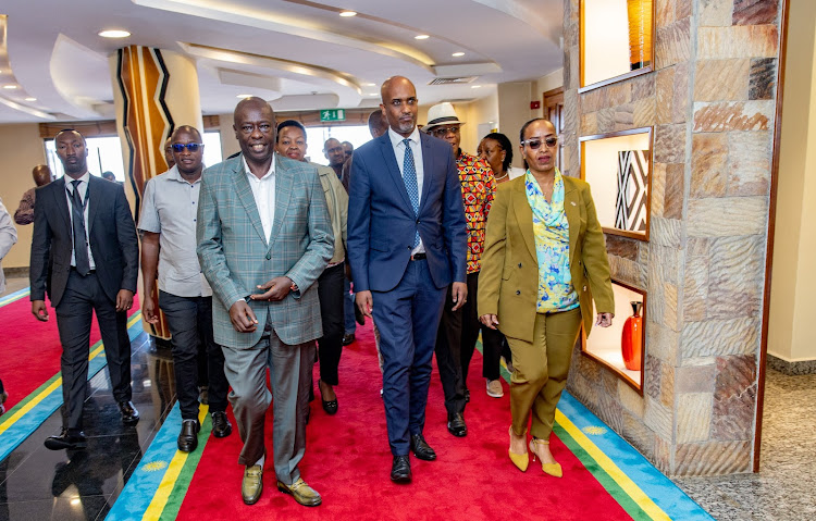 Deputy President Rigathi Gachagua with Rwanda Minister of Justice and Attorney General Emmanuel Ugirashebuja and Kenya High Commissioner to Rwanda Ambassador Janet Mwawasi Oben and his delegation in Kigali, Rwanda on April 6, 2024.