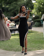 Violinist entertaining guests at the Armani Beauty launch
