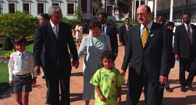 Philma Manuel with President Nelson Mandela, her son Trevor and her grandchildren at parliament in Cape Town in 1997.