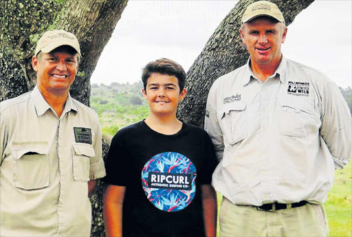 SAVING RHINOS: Riley Devan, 13, a Grade 8 pupil at Selborne College, has raised more than R25 000 for organisations involved with saving rhinos. Riley is flanked by Chipembere Rhino Foundation’s Brent Cook, left, and Dr Williams Fowlds Picture: SUPPLIED