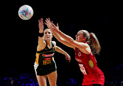 England's Natalie Haythornthwaite (R) in action with South Africa's Shadine van der Merwe (L) during the Netball World Cup bronze medal playoff match against hosts England at M&S Bank Arena in Liverpool on July 21 2019. 