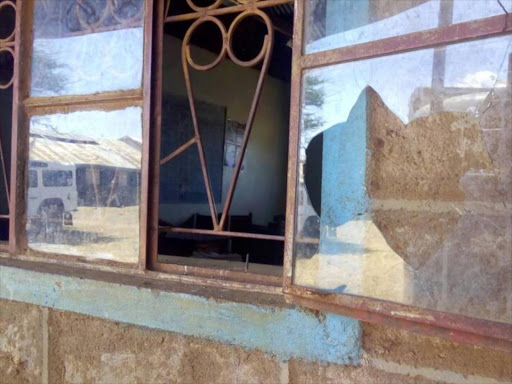 A window that was broken during protests by pupils of Kirimon Primary School in Samburu West, June 19, 2017. /MARTIN FUNDI