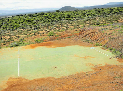 MESS: A netball court covered in soil due to no landscaping being done on its perimeter, at the Glenmoore sports fields Picture: MANDILAKHE KWABABANA