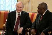Russian President Vladimir Putin and President Cyril Ramaphosa speak after a meeting with delegation of African leaders to discuss their proposal for peace talks between Russia and Ukraine, in Saint Petersburg, Russia June 17, 2023. 