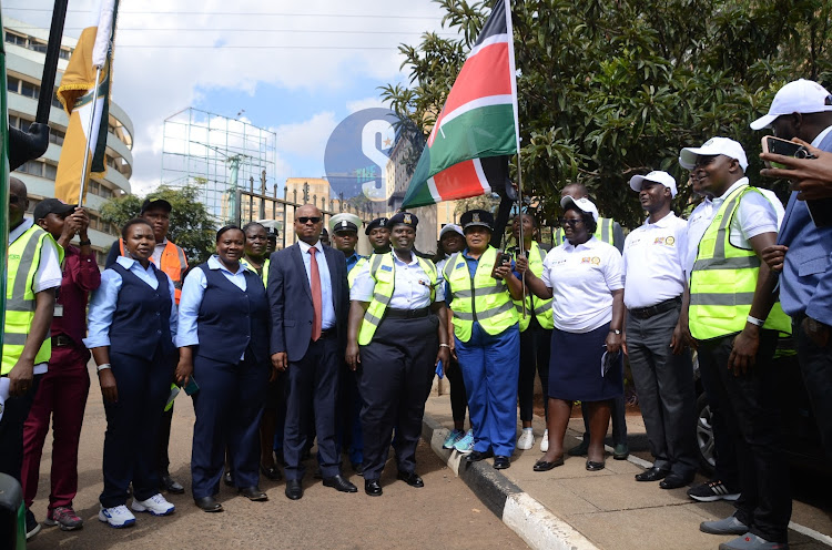 Magistrate Esther Kimilu, Martha Nanzushi, Geoffrey Onsarigo, Kenya Police Service SSP Wilfrida Rotich, chief magistrate Susan Shitubi and Lucas Onyina among others during the traffic open day flag off at Milimani Law Courts on March 20, 2024