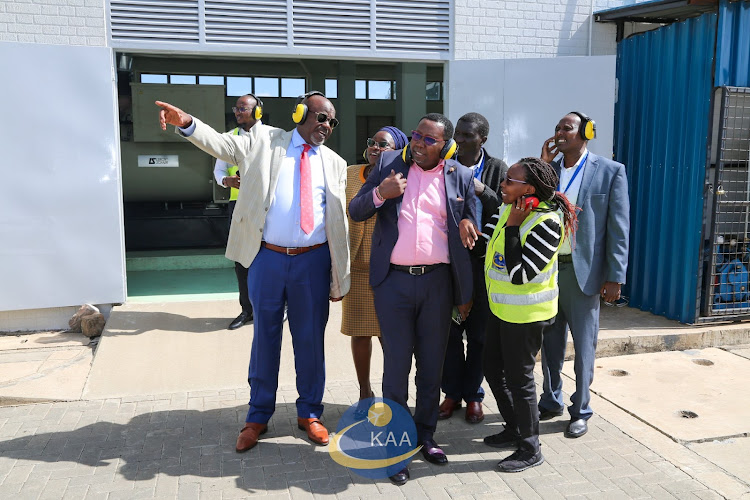 KAA chairman Caleb Kositany with other officials when he inspected the generators at JKIA on January 29, 2024.