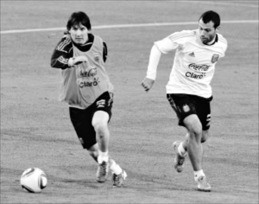 PRETORIA, SOUTH AFRICA - JUNE 03: Lionel Messi (L) of Argentina national footbal team and teammate Javier Mascherano during the Argentina team training session on June 3, 2010 in Pretoria, South Africa. Photo Getty Images / Gallo Images