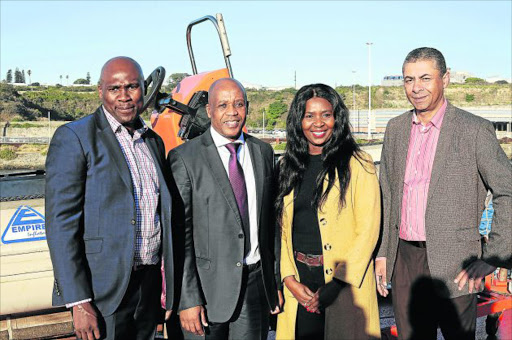 MARITIME DRIVE: Eastern Cape Premier Phumulo Masualle, (second left) together with the SA Maritime Safety Authority (Samsa), launched the Eastern Cape Provincial Maritime Youth Development Programme yesterday. With him is Samsa’s COO Sobantu Tilayi, left, acting EL port manager Sharon Sijako and Samsa’s Ian Calvert Picture: RANDELL ROSKRUGE