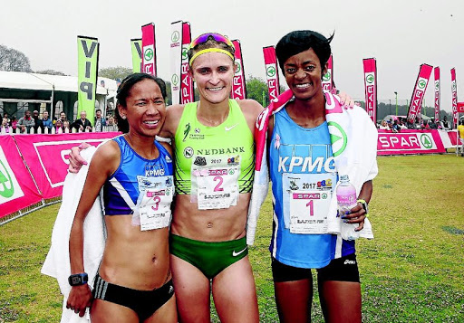 Kesa Molotsane, right, held off strong competition from Nolene Conrad, left, and defending champion Irvette van Zyl to clinch the Spar Grand Prix despite a second place finish at the weekend. / Reg Caldecot