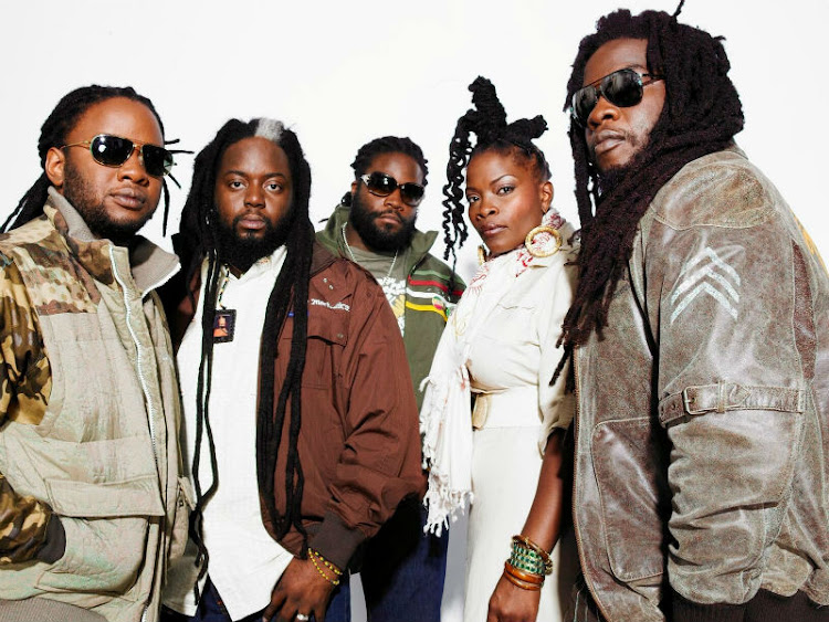 The 5 members of the Morgan Heritage Band.