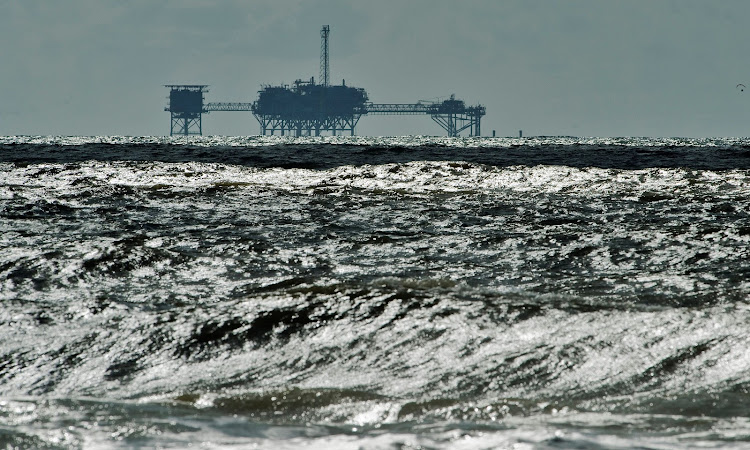 An oil and gas drilling platform stands offshore in the Gulf of Mexico in Dauphin Island, Alabama. Picture: REUTERS/STEVE NESIUS