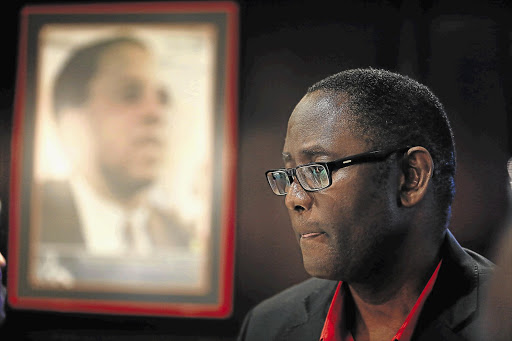 NO GRUDGES? Zwelinzima Vavi at Cosatu House in Johannesburg yesterday after returning to work as the labour federation's secretary-general eight months after being put on 'special leave'