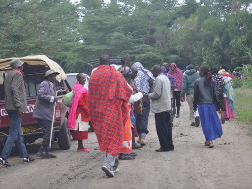 Commuters plying the Isinya/Konza road were stranded for close to seven hours after Maasai morans barricaded the route over its bad state.Photo/Kurgat Marindany