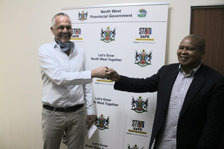 CEO of Country Bird Holdings, Brendon de Boer, and North West premier Bushy Maape.