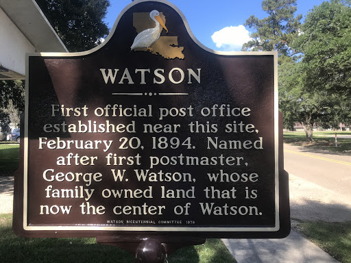 First official post office established near this site, February 20, 1894. Named after first postmaster, George W. Watson, whose family owned land that is now the center of Watson.