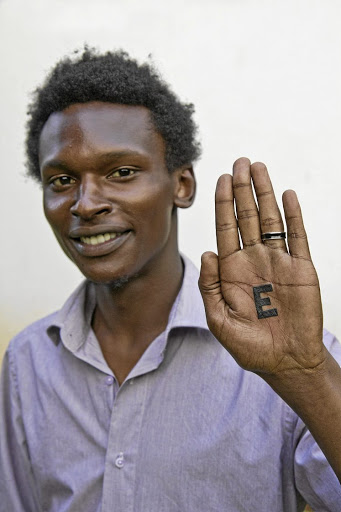 One of the 4,000 participants in the worldwide human rights tattoo project.