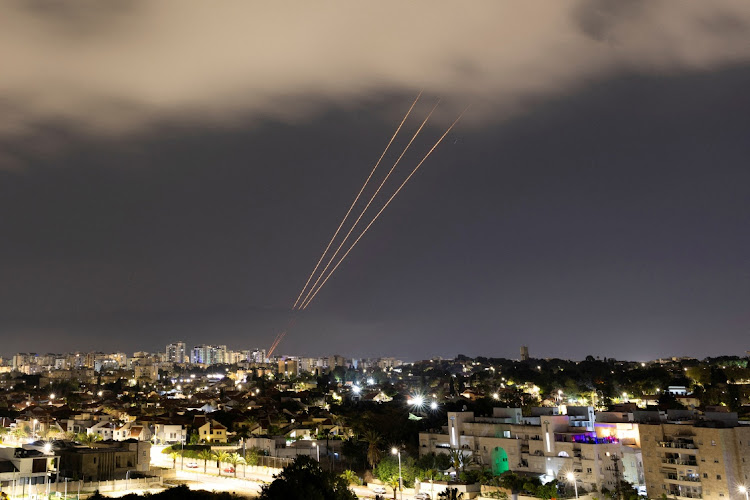 An antimissile system operates after Iran launched drones and missiles towards Israel, as seen from Ashkelon, Israel, on April 14 2024.