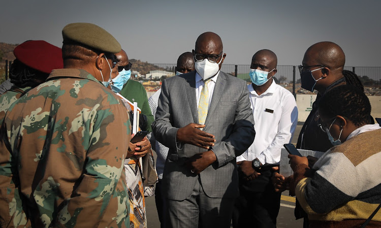 Gauteng premier David Makhura and health MEC Dr Nomathemba Mokgethi with a delegation from the SANDF that has been deployed to Gauteng in response to the Covid-19 pandemic.