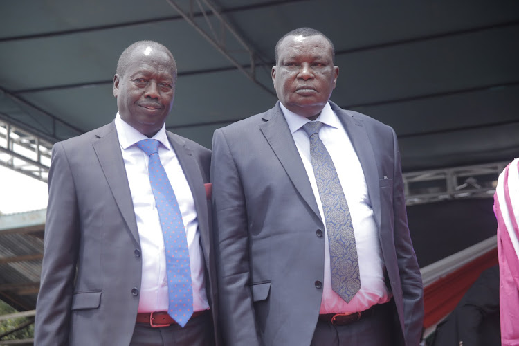 Baringo Governor Benjamin Cheboi with Charles Kipng’ok during their inauguration at Kabarnet show ground on August 25