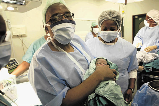 Health Minister Aaron Motsoaledi at the Mankweng Hospital, near Polokwane, Limpopo, where he delivered the baby that might be the world's 7-billionth inhabitant yesterday. Picture: Lebohang Mashiloane