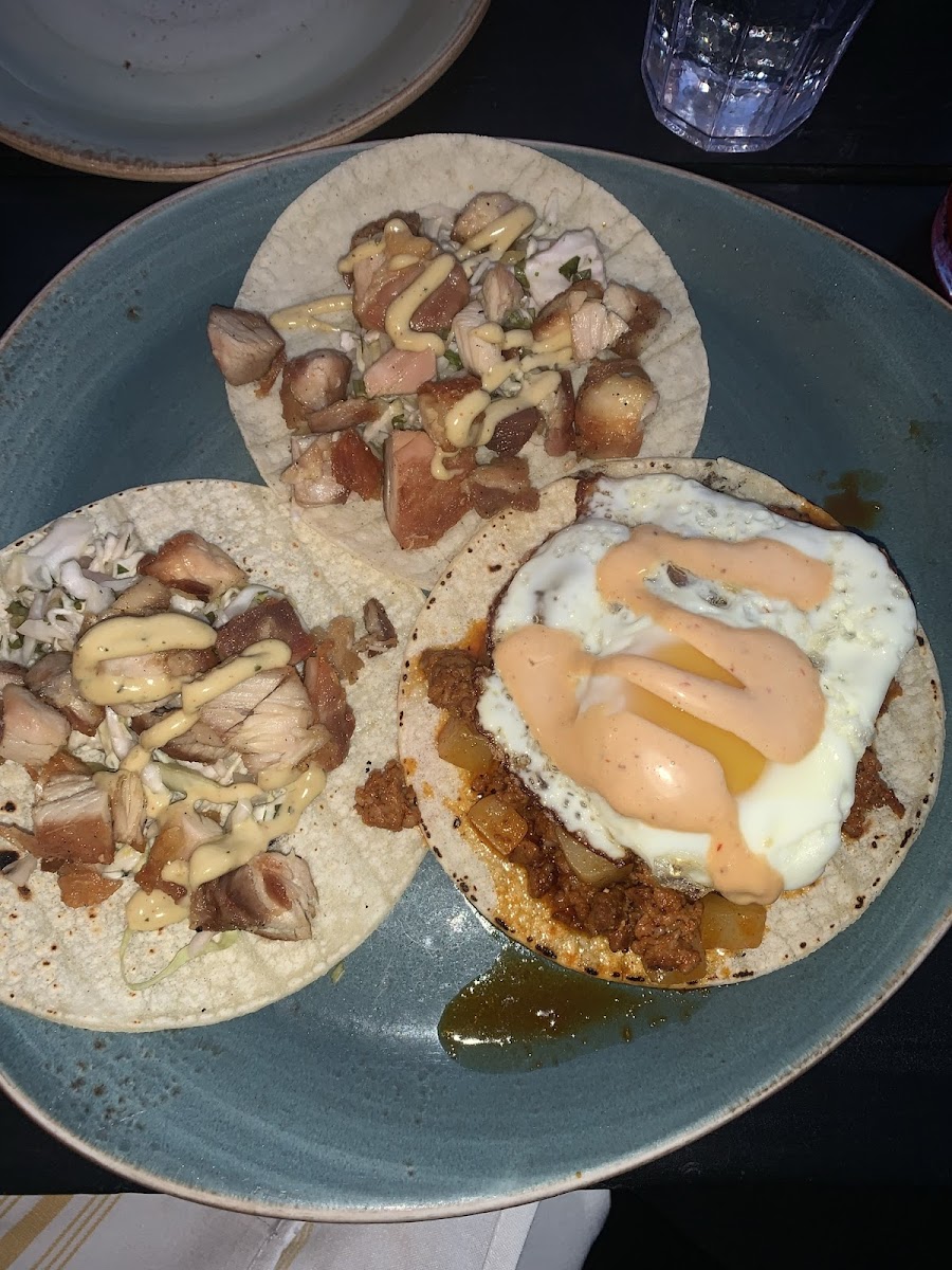 Chicken tacos and a chorizo taco with an egg! So good!