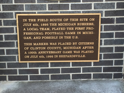 In the field south of this site on July 4th, 1895 the Michigan Rushers, a local team, played the first professional football game in Michigan, and possibly in the U.S.   This marker was placed by...