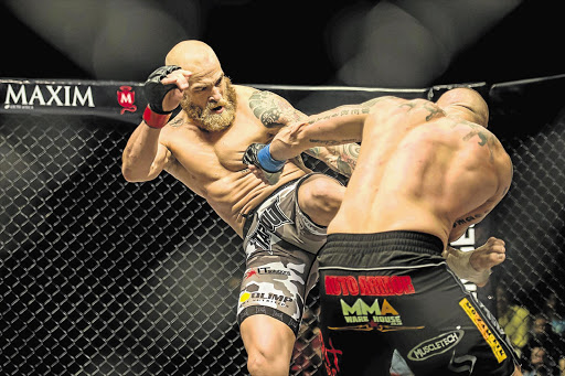 RING KING: Garreth McLellan, left, in an EFC Africa Middleweight Championship fight against Jeremy Smith at Carnival City, Johannesburg