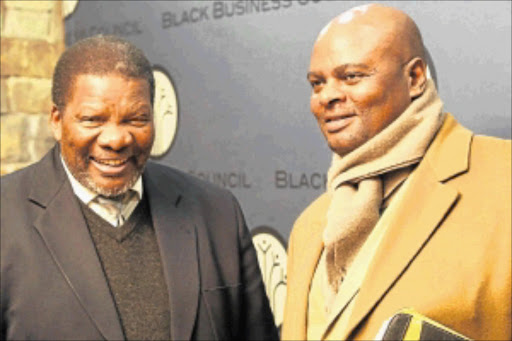 FRANK TALK: Minister of Rural Development and Land Reform Gugile Nkwinti and Lucas Mteto at the Black Business Council meeting in Sandton, Johannesburg. PHOTO: ANTONIO MUCHAVE