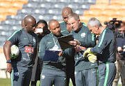 Bafana Bafana coach Stuart Baxter with Alex Heredia and Thabo Senong during the South African national mens soccer team training session at FNB Stadium on June 06, 2017 in Johannesburg, South Africa.