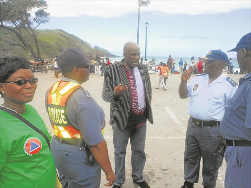 Hawks Head Lieutenant General Mthandazo Ntlemeza with Port St John’s Cluster Commander Brigadier Nompumelelo Majikijela and provincial deputy police commission Major General Zamuthango Mki in Port St John’s.