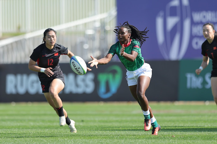 Kenya Lionesses Judith Auma attempts a pass during their Challenger sevens series match against China in Dubai in January