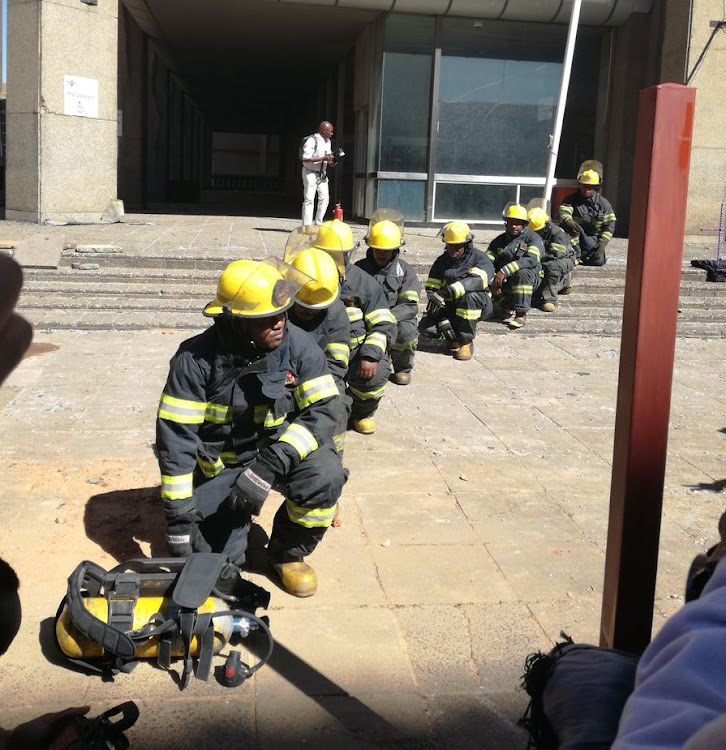 Firefighters honour their colleagues who died when a Gauteng government building caught fire in Johannesburg CBD.