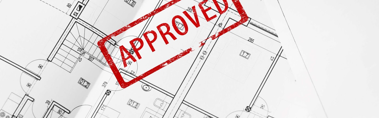 approved stamp on blueprint architectural designs