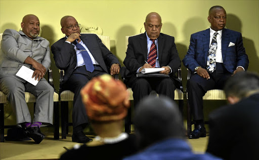 President Jacob Zuma and Finance Minister Pravin Gordhan with Business Unity South Africa president Jabu Mabuza, left, and Black Business Council president Ndaba Ntsele.