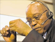 HELLO: President Jacob Zuma listens to a caller while viewing call volumes on the log screen. Pic: Ntswe Mokoena. 14/09/2009. © GCIS
Union Buildings, Tshwane, Pretoria.14/09/09