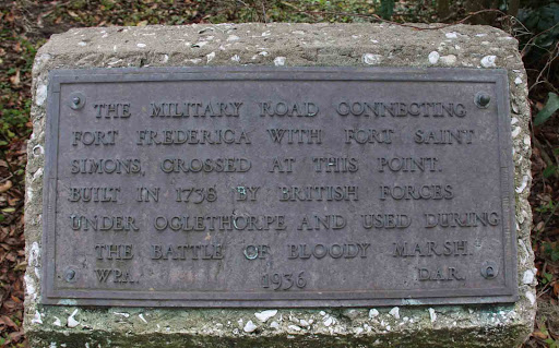 The military road connecting Fort Frederica with Fort Saint Simons crossed at this point. Built in 1736 by British forces under Oglethorpe and used during the Battle of Bloody Marsh. Placed by the...