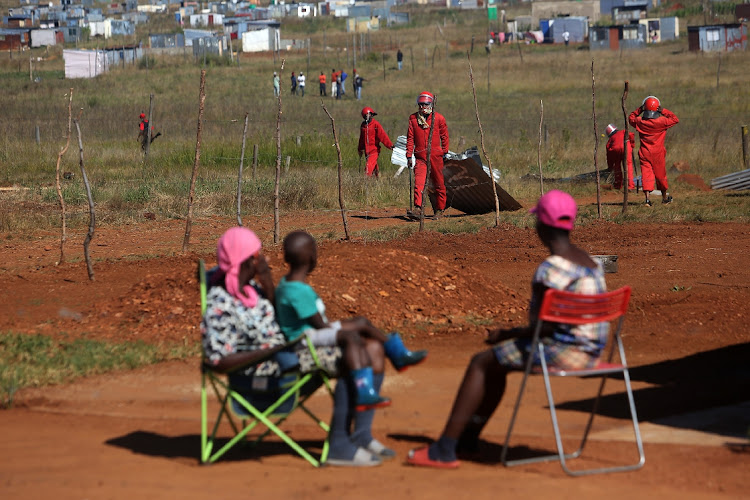 Johannesburg Mayor Geoff Makhubo ordered security and evictions company, Red Ants to destroy shacks and houses that had allegedly been illegally built by residents of Kokotela informal settlement in Lawley, south of Johannesburg on April 21 2020. Picture: ALON SKUY