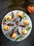 Insima balls with herbs and biltong is one of Nompumelelo Mqwebu's modern South African dishes.