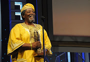 SGUDI S’NAYSI:  Joe   Mafela receives a lifetime achievement award at the South African Film and Television Awards. Pic: VATHISWA RUSELO. 21/02/2010. © Sowetan