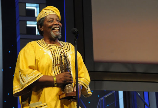 SGUDI S’NAYSI: Joe Mafela receives a lifetime achievement award at the South African Film and Television Awards. Pic: VATHISWA RUSELO. 21/02/2010. © Sowetan