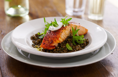 grilled salmon over lentils!delicious combination cooked to perfection!