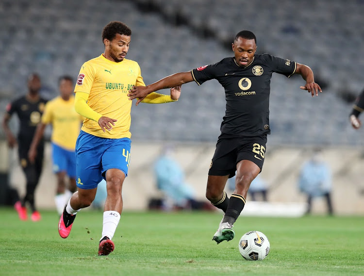 Bernard Parker of Kaizer Chiefs is challenged by Rivaldo Coetzee of Mamelodi Sundowns during the Absa Premiership match between Chiefs and Sundowns at Orlando Stadium on August 27 in Johannesburg.