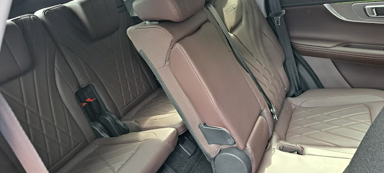 The middle row seats are separately adjustable for comfort, and the third row seats fold down to expand boot space.