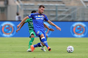 Bradley Grobler of Supersport United challenged by Andile Fikizolo of Bloemfontein Celtic during the first leg of the MTN8 Semi Final match between SuperSport United and Bloemfontein Celtic at Lucas Moripe Stadium on November 1 2020 in Pretoria.